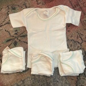 4 pack! Med line white baby shirts 6 mos size 2